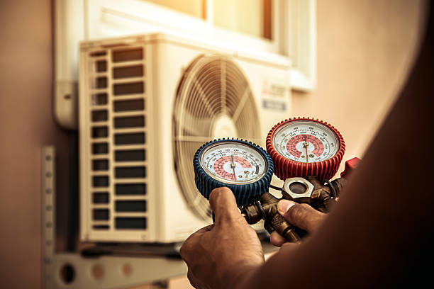 Professional Air Conditioning Service technician working in Five Points, OH